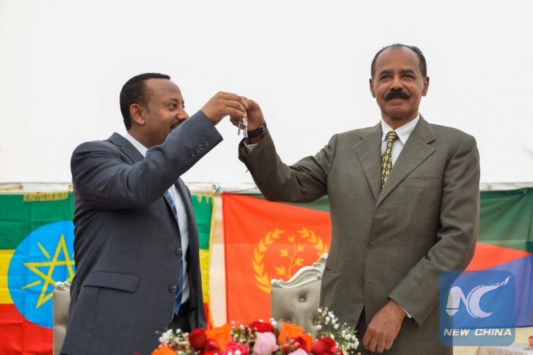 Eritrean President Isaias Afwerki (R) and Abiy Ahmed, Ethiopian Prime Minister are seen during the re-opening of the Eritrean Embassy in Addis Ababa, capital of Ethiopia, July 16, 2018.(Xinhua/Michael Tewelde)