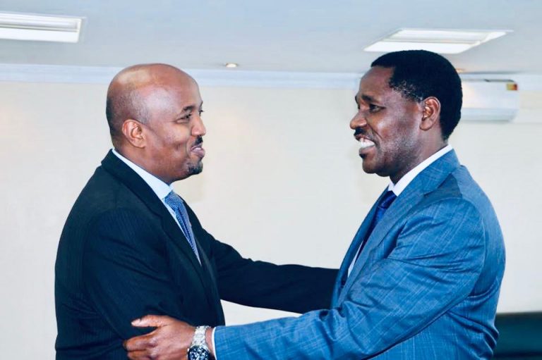 Somaliland envoy to Kenya Mr Bashe Awil Omar and Minister for Trade Peter Munya at the Trade ministry offices in Nairobi on November 15, 2018. PHOTO | COURTESY