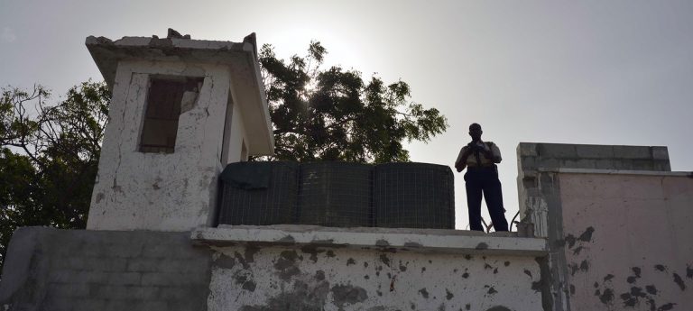 UN Photo/Tobin Jones Guard at watchtower of UN Compound in Mogadishu, Somalia (file photo, June 2013).