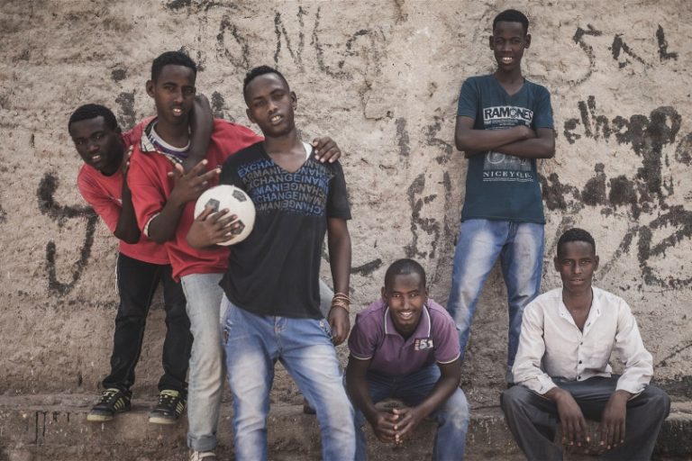 A group of young men in Somaliland’s capital, Hargeisa, take a break from an informal football match. Youth unemployment in Somaliland is among the highest in the world at between 60 and 70 per cent. Photo: Adrian Leversby/IRIN