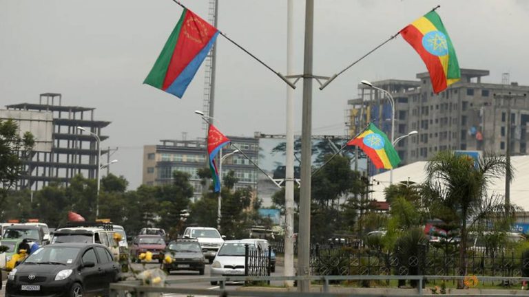 FILE PHOTO: Ethiopia's and Eritrea's flags are displayed on the street ahead of Eritrea's President Isaias Afwerki's visit to Addis Ababa, Ethiopia July 13, 2018. REUTERS/Tiksa Negeri/File Photo Read more at https://www.channelnewsasia.com/news/world/eritrea-closes-border-crossing-to-ethiopians--official-and-residents-say-11070902