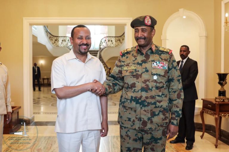 Ethiopian PM Abiy Ahmed Handshake with Lieutenant General Abdel-Fattah Burhan, head of the Sudanese Transitional Military Council
