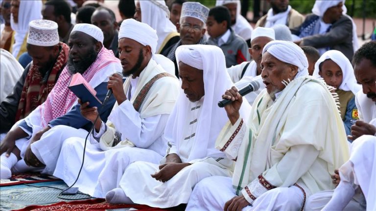 Muslims gather to perform the Eid Al-Adha prayer at Addis Ababa Stadium in Ethiopia on August 11, 2019. Muslims worldwide celebrate Eid Al-Adha, to commemorate the holy Prophet Ibrahim's (Prophet Abraham) readiness to sacrifice his son as a sign of his obedience to God, during which they sacrifice permissible animals, generally goats, sheep, and cows. Eid-al Adha is the one of two most important holidays in the Islamic calendar, with prayers and the ritual sacrifice of animals. ( Minasse Wondimu Hailu - Anadolu Agency )