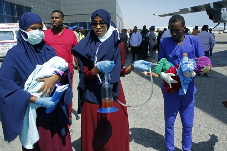 Medical personnel carry wounded children to be airlifted to the Turkish capital for treatment after they were injured in Saturday’s car bomb blast in Mogadishu, Somalia, Sunday, Dec. 29, 2019./AP