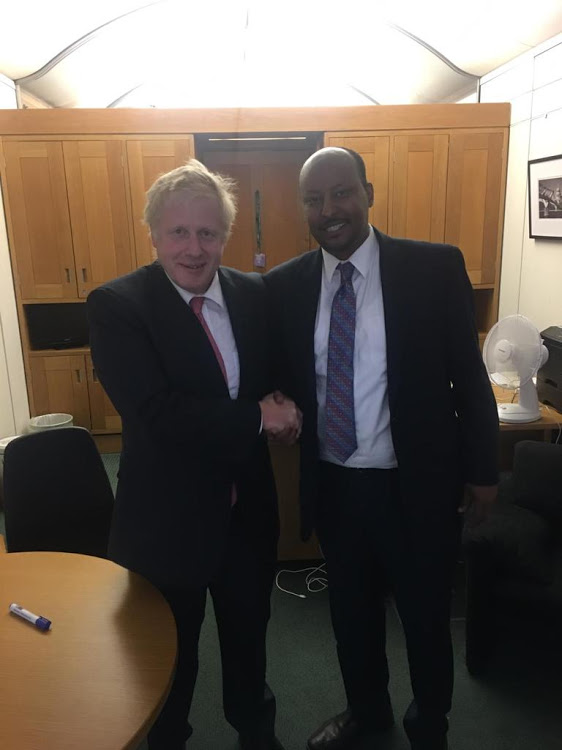 The CEO of Dahabshiil, Abdirashid Duale, with British Prime Minister Boris Johnson