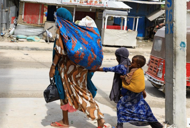 FILE PHOTO: Civilians flee following gunfire between factions within Somalia's security forces near KM4 in Hodan district of Mogadishu, Somalia April 26, 2021. REUTERS/Feisal Omar