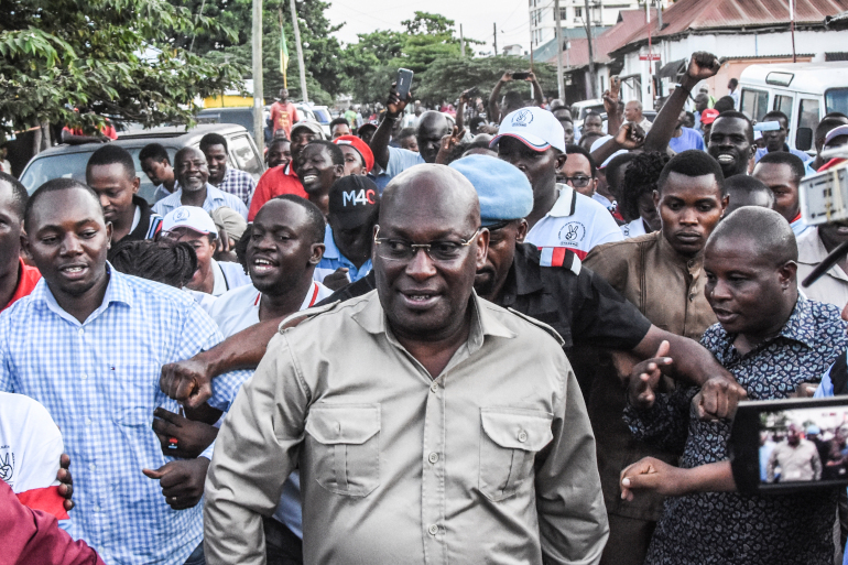 Tanzania Chadema party chairman Freeman Mbowe, centre, was arrested in the Lake Victoria port city of Mwanza [File: Ericky Boniphace/AFP]