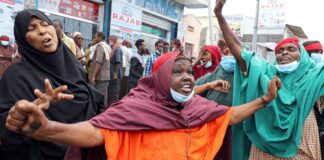 Somali women react at a protest against the African Union Mission in Somalia outside the Erdogan Hospital following the killing of civilians during a gunfight between AMISOM and al-Shabab fighters in the Lower Shabelle region, in Mogadishu, Aug. 12, 2021.