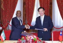 Taiwanese Foreign Minister Joseph Wu (right) and his then-counterpart from Somaliland, Yasin Hagi Mohamoud, shake hands after signing an agreement in Taipei on Feb. 26, 2020. | Taiwan Ministry of Foreign Affairs via AP