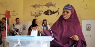 A woman casts her vote in the presidential election in Hargeisa, Somaliland, Nov. 13, 2017.