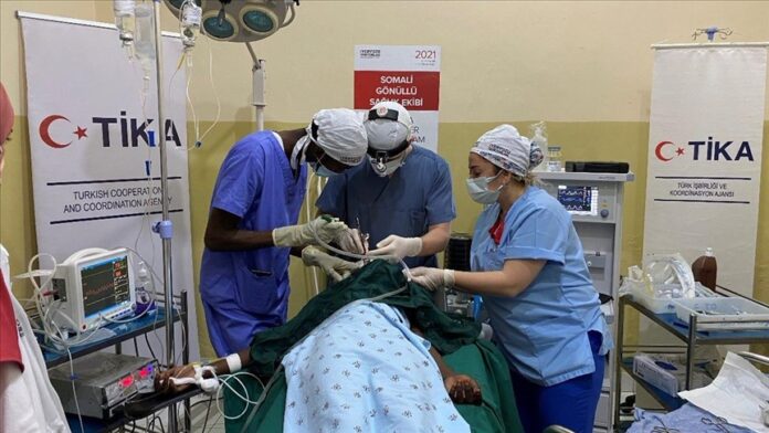 Doctors Worldwide Turkiye’s Mogadishu health center perform a surgery in the Somali capital Mogadishu on January 21, 2022. ( Photo Credit: TIKA )