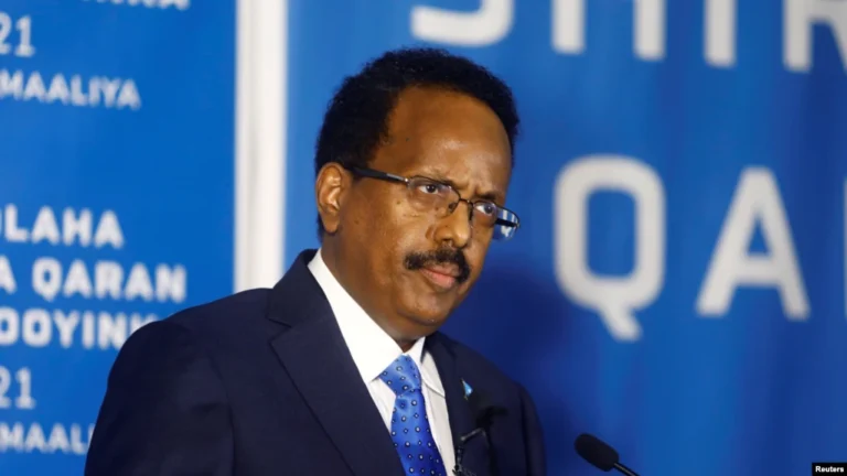 FILE - Somalia's President Mohamed Abdullahi Mohamed addresses delegates at the Somali election negotiation in Mogadishu, May 27, 2021.