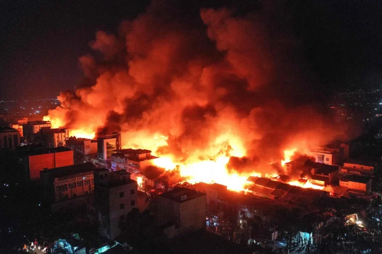 This aerial view shoes plumes of smoke billowing from the site of a fire that broke out at the Waaheen market in Hargeisa, Somaliland, on April 2, 2022. MATAAN YUUSUF/AFP/GETTY IMAGES