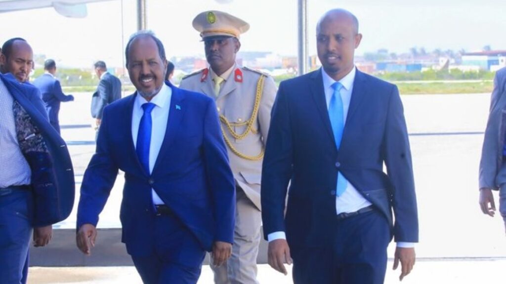 Somali President Hassan Sheikh Mohamud (left) at the Aden Adde International Airport in Mogadishu, Somalia. PHOTO | VILLA SOMALIA
