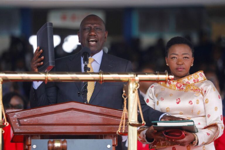 Kenya's incoming President William Ruto takes the oath of office as his wife Rachel Ruto stands by his side during the official swearing-in ceremony at Moi International Stadium Kasarani in Nairobi, Kenya September 13, 2022. REUTERS/Baz Ratner