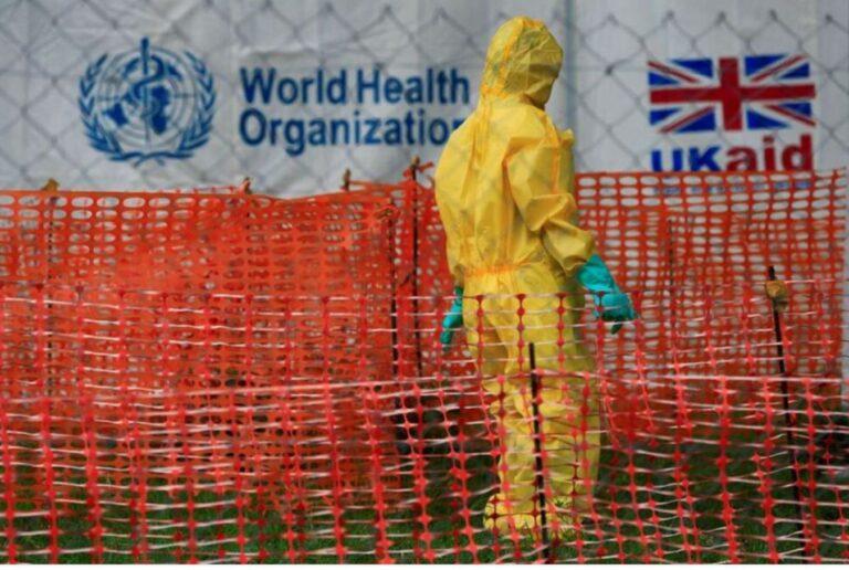FILE PHOTO: A person dressed in Ebola protective apparel is seen inside an Ebola care facility at the Bwera general hospital near the border with the Democratic Republic of Congo in Bwera, Uganda, June 14, 2019. REUTERS/James Akena?/File PhotoREUTERS