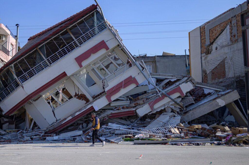A man walks in front of a destroyed building in Samandağ, south of Hatay on Feb. 16, 2023, ten days after two major quakes struck the border region of Türkiye and Syria. (AFP Photo) RECOMMENDED Aid collected in Washington being loaded onto plane at Washington Dulles airport, Feb. 17, 2023. (AA Photo) Countries continue to send aid to Türkiye after quakes EARTHQUAKE