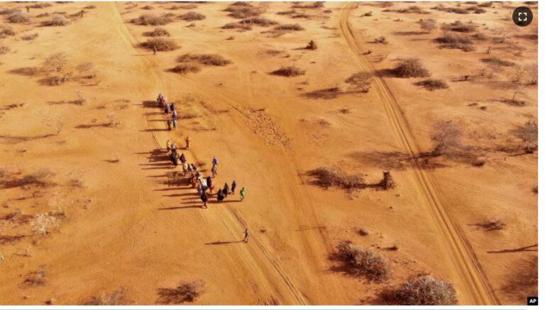 FILE - People arrive at a displacement camp near Dollow, Somalia, Sept. 21, 2022, amid a drought. The United Nations estimates that 1.4 million Somalis have been displaced by current droughts. Somalia's census team will count temporary nomadic settlements using satellite imagery.