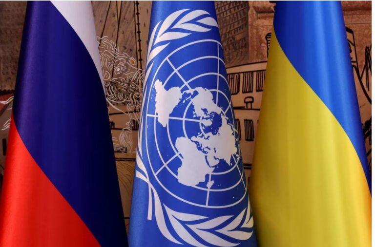 Flags of Russia, the United Nations and Ukraine are seen on the day of a signing ceremony in Istanbul, Turkey July 22, 2022. REUTERS/Umit Bektas/File Photo