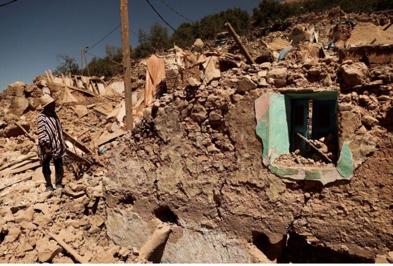 Mohamed Ouchen, 66, a survivor, who helped to pull his sister and her husband with their children from rubble, looks at his destroyed house, in the aftermath of a deadly earthquake, in Tikekhte, near Adassil, Morocco, September 11, 2023. REUTERS/Nacho Doce
