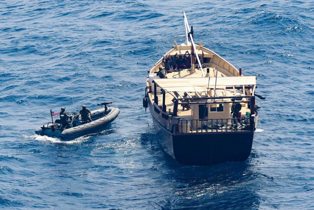 Members of the U.S. military boarded and searched a flagless ship off the coast of Somalia to search for weapons and other smuggled contraband in 2020.Credit...Louis Thompson Staats IV/U.S. Navy