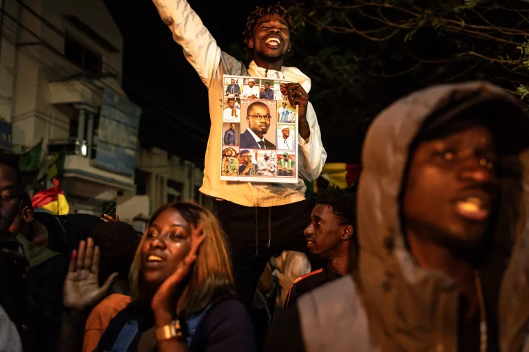 Supporters of Bassirou Diomaye Faye and the opposition leader Ousmane Sonko celebrating in Dakar on Sunday.Credit...John Wessels/Agence France-Presse — Getty Images