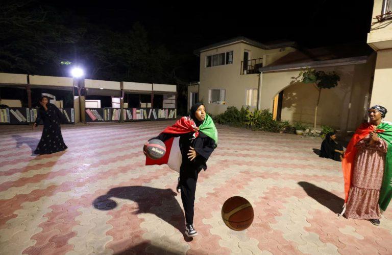 Hafsa Sead, 21, member of the Hargeisa Basketball Girls team dribbles a ball during the Independence Day eve celebrations in Hargeisa, Somaliland, May 17, 2024. REUTERS/Tiksa Negeri Purchase Licensing Rights