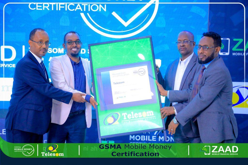Telesom officials receive the GSMA certification in Hargeisa.