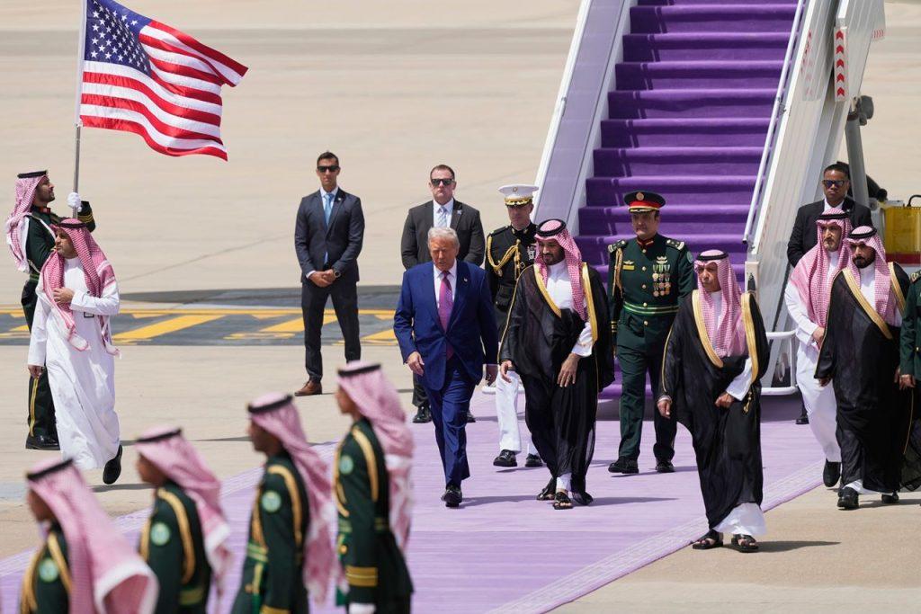 President Donald Trump walks with Saudi Crown Prince Mohammed bin Salman during an arrival ceremony at the Royal Terminal of King Khalid International Airport in Riyadh, Saudi Arabia, on Tuesday. Alex Brandon/AP