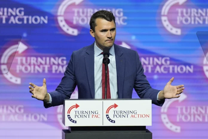 FILE - Turning Point USA Founder Charlie Kirk speaks during a campaign rally, Oct. 24, 2024, in Las Vegas.