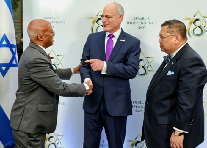 Ambassador Bashir Goth and former U.S. Special Envoy for the Sahel J. Peter Pham attend Israel’s Independence Day event alongside Israeli Ambassador Yechiel Leiter in Washington.