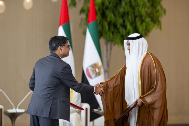 Officials from the United Arab Emirates and India exchange signed agreements during a ceremony in Abu Dhabi witnessed by Mohamed bin Zayed Al Nahyan and Narendra Modi. Photo by WAM.