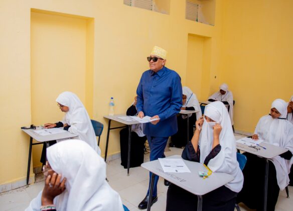 Somaliland President Abdirahman Mohamed Abdullahi Irro distributes national examination papers to students during the official launch of the 2026 Somaliland National Certificate Examinations at Farah Omar Secondary School in Hargeisa. A record 42,519 students are sitting this year's nationwide examinations.