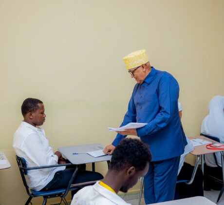 Somaliland President Abdirahman Mohamed Abdullahi Irro distributes national examination papers to students during the official launch of the 2026 Somaliland National Certificate Examinations at Farah Omar Secondary School in Hargeisa. A record 42,519 students are sitting this year's nationwide examinations.