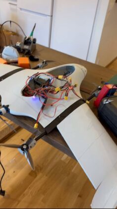A young engineer conducts field testing of a fixed-wing unmanned aerial vehicle (UAV) prototype, showcasing the development, assembly and flight preparation of an indigenous drone system designed for autonomous operations. The project highlights growing innovation in aerospace engineering, unmanned aviation and next-generation technology.