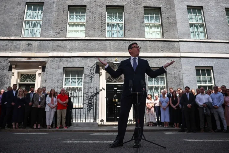 Andy Burnham gives his first speech as British prime minister at 10 Downing Street in London [Henry Nicholls/AFP]