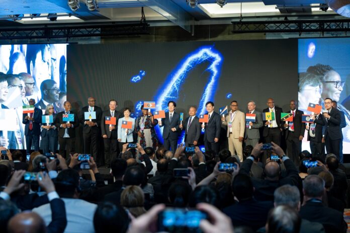 Representatives of the alliance’s founding members, including Somaliland, hold their flags alongside Taiwan President Lai Ching-te at the launch ceremony in Taipei on September 19, 2026.