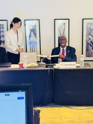 Somaliland&rsquo;s Interior and Security Minister Abdalle Mohamed Arab holds up a document at the inaugural assembly of the World Alliance for Disaster Management in Taipei on September 19, 2026.