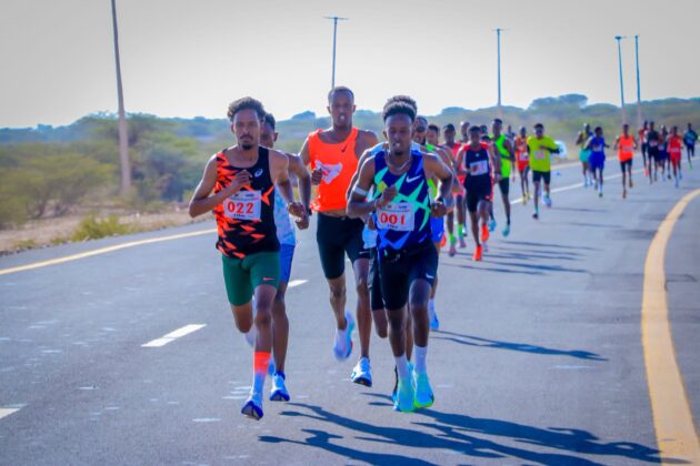 Fuad Sead Ali, wearing bib 001, runs with fellow competitors during the Hargeisa International Half Marathon in Somaliland, October 2, 2026.