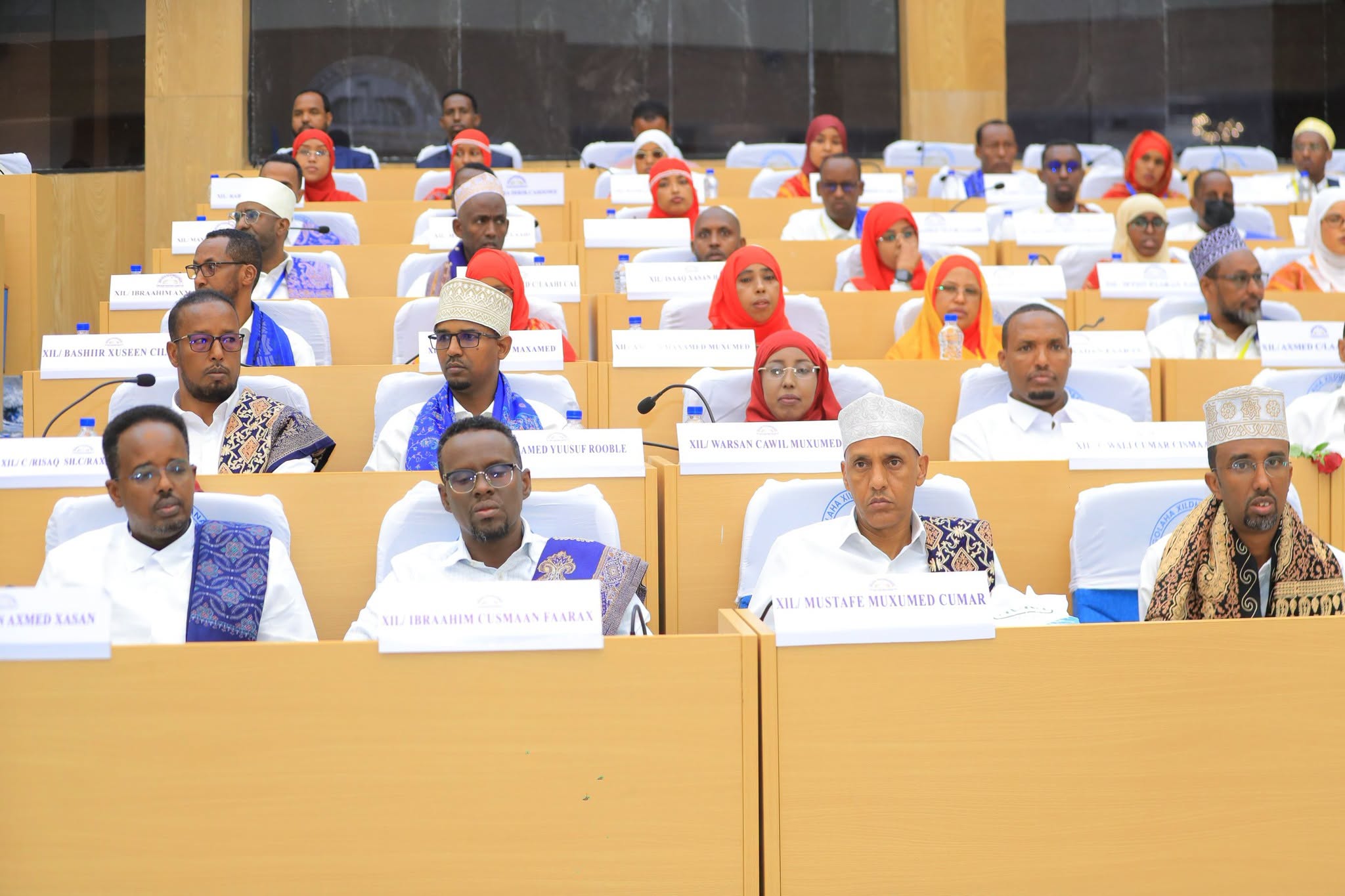 Somali Region President Mustafa Muhumed Omer and Vice President Ibrahim Osman Farah, seated beside him on the left, attend a parliamentary session in Jigjiga at which lawmakers re-elected both officials.