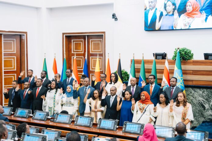 Ethiopian Prime Minister Abiy Ahmed poses for a group photograph with members of his newly approved Cabinet in Addis Ababa, as the government begins a new five-year term under the Medemer administration. Ethiopian Prime Minister Abiy Ahmed poses for a group photograph with members of his newly approved Cabinet in Addis Ababa, as the government begins a new five-year term under the Medemer administration.