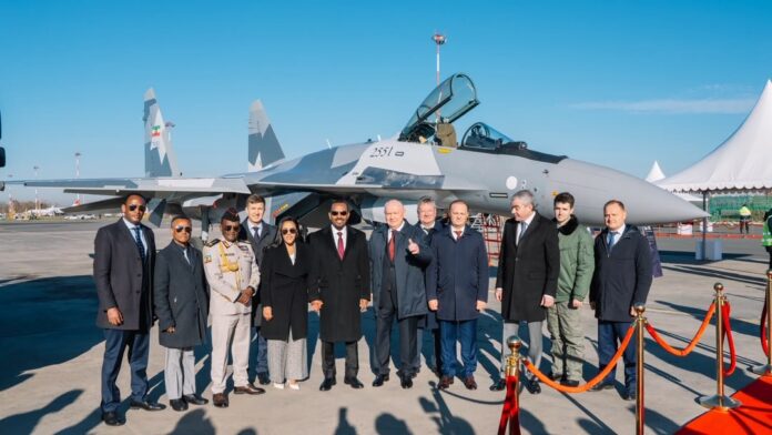 Ethiopian Prime Minister Abiy Ahmed poses with Ethiopian and Russian officials in front of a Russian-made Su-35 fighter jet during a ceremony marking the delivery of new military aircraft to Ethiopia on October 28, 2026. Photo: Abiy Ahmed/X.